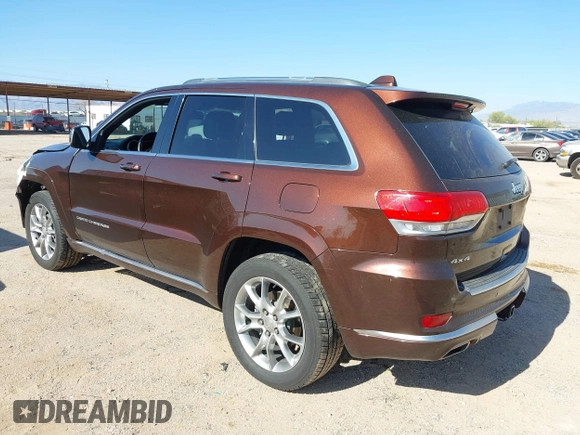 2015 Jeep Grand Cherokee Summit with VIN 1C4RJFJGXFC125131, listed as a IAAI auction lot 42475017 with 128,166 mi miles and . Bid and sale history available at DreamBid. Image 3.