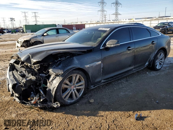 2014 Jaguar XJ Portfolio with VIN SAJWJ2GD6E8V73491, listed as a Copart auction lot 42472345 with 68,747 mi miles and Salvage title. Bid and sale history available at DreamBid. Image 1.
