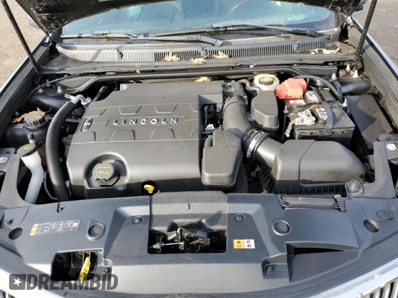 2016 Lincoln MKS с VIN 1LNHL9DK0GG601111, выставлен на аукционе Copart как лот 88354865 с пробегом 96 298 миль миль и Списание • Salvage title. История ставок и продаж доступна на DreamBid. Изображение 13.