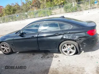 2015 BMW 4 Series 428i z VIN WBA4A9C58FGL85170, wystawiony jako IAAI lot #41362595 z przebiegiem 172 509 mil mil oraz . Historia ofert i sprzedaży dostępna na DreamBid. Obrazek 14.