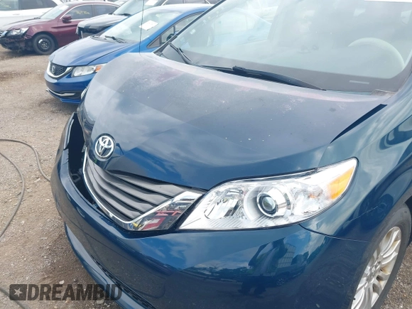 2011 Toyota Sienna XLE AAS with VIN 5TDYK3DC6BS045303, listed as a IAAI auction lot 42515203 with 205,904 mi miles and . Bid and sale history available at DreamBid. Image 18.