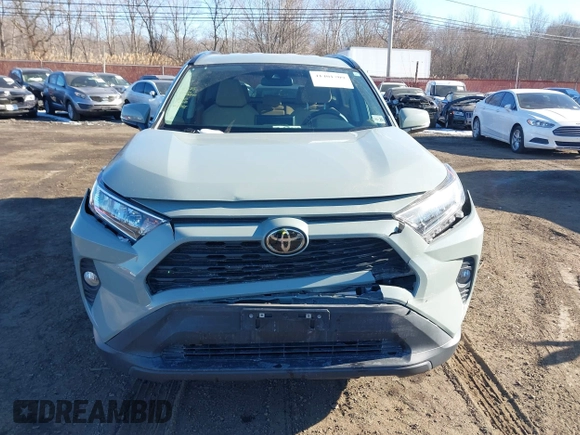 2021 Toyota RAV4 XLE with VIN 2T3W1RFV8MW152785, listed as a IAAI auction lot 41401709 with 55,069 mi miles. Bid and sale history available at carsss.com. Image 12.