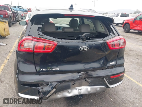 2017 Kia Niro Touring with VIN KNDCE3LC6H5048381, listed as a IAAI auction lot 42035129 with 133,559 mi miles. Bid and sale history available at carsss.com. Image 6.