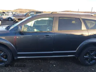 2018 Dodge Journey Crossroad with VIN 3C4PDDGGXJT386542, listed as a IAAI auction lot 40976857 with 147,853 mi miles and . Bid and sale history available at DreamBid. Image 14.