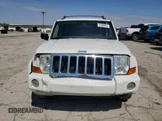 2010 Jeep Commander Sport with VIN 1J4RG4GKXAC121954, listed as a Copart auction lot 51965925 with 144,115 mi miles and Salvage title. Bid and sale history available at DreamBid. Image 5.
