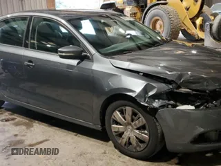 2012 Volkswagen Jetta SE with VIN 3VWDX7AJ1CM344402, listed as a Copart auction lot 69927324 with 173,569 mi miles and Salvage title. Bid and sale history available at DreamBid. Image 4.