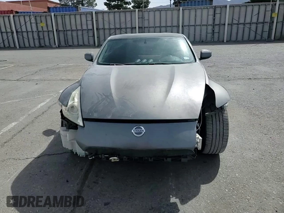 2014 Nissan 370Z z VIN JN1AZ4EH0EM630751, wystawiony jako Copart lot #51489825 z przebiegiem 125 107 mil mil oraz Czysty tytuł • Clean title. Historia ofert i sprzedaży dostępna na DreamBid. Obrazek 11.