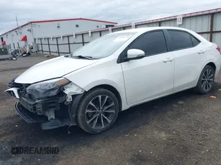 2019 Toyota Corolla L with VIN 5YFBURHE1KP937059, listed as a IAAI auction lot 41901278 with 98,796 mi miles and . Bid and sale history available at DreamBid. Image 18.