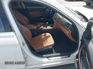 2013 BMW 3 Series 328i with VIN WBA3C1C5XDF437585, listed as a IAAI auction lot 42025388 with 101,963 mi miles. Bid and sale history available at carsss.com. Image 5.