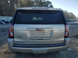 2015 GMC Yukon SLE with VIN 1GKS1AKC4FR265208, listed as a Copart auction lot 42324245 with 105,760 mi miles and Salvage Title. Bid and sale history available at carsss.com. Image 6.