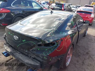 2013 Hyundai Genesis Coupe 2.0T z VIN KMHHT6KD2DU097886, wystawiony jako IAAI lot #41864894 z przebiegiem 152 642 mil mil oraz . Historia ofert i sprzedaży dostępna na DreamBid. Obrazek 4.