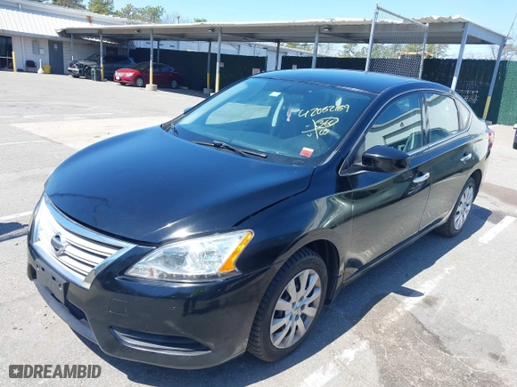 2015 Nissan Sentra S with VIN 3N1AB7AP5FY333069, listed as a IAAI auction lot 42082189 with 100,157 mi miles. Bid and sale history available at carsss.com. Image 2.
