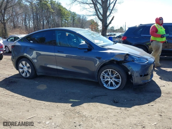 2023 Tesla Model Y Long Range with VIN 7SAYGDEEXPA175104, listed as a IAAI auction lot 41821928 with 52,791 mi miles. Bid and sale history available at carsss.com. Image 13.