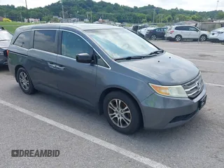 2011 Honda Odyssey EX-L with VIN 5FNRL5H68BB062321, listed as a IAAI auction lot 42783509 with 297,668 mi miles and . Bid and sale history available at DreamBid. Image 1.
