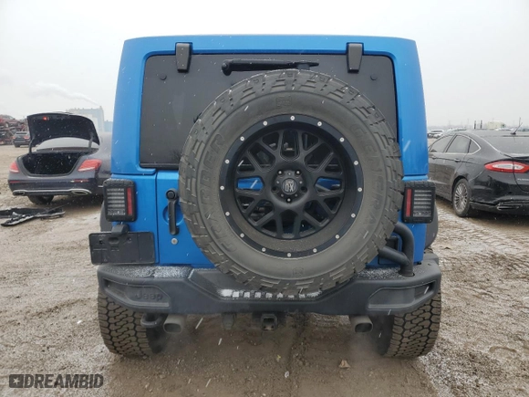 2015 Jeep Wrangler Unlimited Sahara with VIN 1C4BJWEGXFL526853, listed as a Copart auction lot 44904025 with 110,110 mi miles and Salvage Title. Bid and sale history available at carsss.com. Image 6.