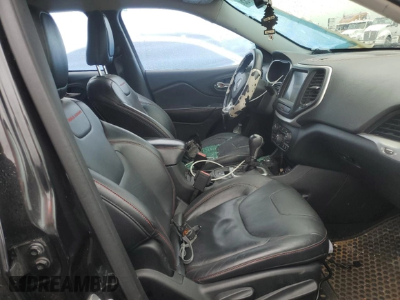 2014 Jeep Cherokee Trailhawk с VIN 1C4PJMBS4EW111401, выставлен на аукционе Copart как лот 57998735 с пробегом Не указан миль и Списание • Salvage title. История ставок и продаж доступна на DreamBid. Изображение 7.