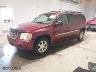 2006 GMC Envoy XL SLE with VIN 1GKET16S666128975, listed as a IAAI auction lot 41303944 with 292,318 mi miles. Bid and sale history available at carsss.com. Image 18.