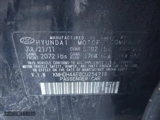 2012 Hyundai Elantra GLS with VIN KMHDH4AE8CU254219, listed as a IAAI auction lot 41206192 with 210,817 mi miles. Bid and sale history available at carsss.com. Image 9.