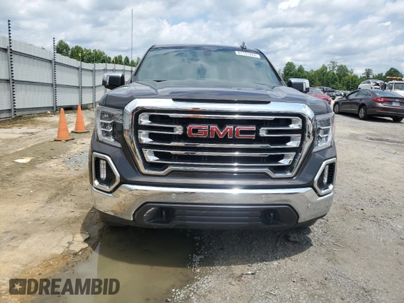 2022 GMC Sierra 1500 with VIN NCS107081, listed as a Copart auction lot 61131224 with 55,588 mi miles and Salvage Title. Bid and sale history available at DreamBid. Image 5.