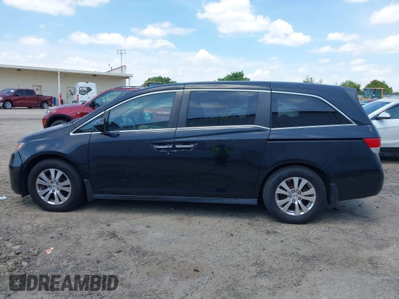 2014 Honda Odyssey EX-L with VIN 5FNRL5H66EB062158, listed as a IAAI auction lot 42072020 with 211,278 mi miles and . Bid and sale history available at carsss.com. Image 14.
