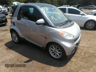 2008 Smart fortwo Pure with VIN WMEEJ31X88K162198, listed as a IAAI auction lot 42809814 with 75,630 mi miles and . Bid and sale history available at DreamBid. Image 1.