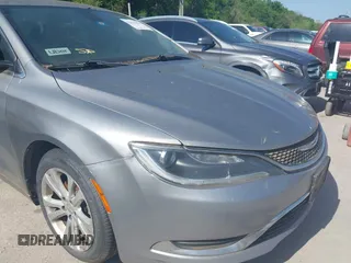 2015 Chrysler 200 Limited with VIN 1C3CCCAB1FN656181, listed as a IAAI auction lot 42011014 with 293,897 mi miles. Bid and sale history available at carsss.com. Image 6.