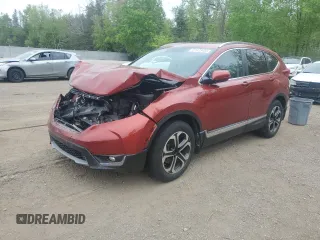 2019 Honda CR-V Touring с VIN 2HKRW2H95KH134223, выставлен на аукционе Copart как лот 57423455 с пробегом 149 345 миль миль и Списание • Salvage title. История ставок и продаж доступна на DreamBid. Изображение 1.