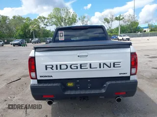 2024 Honda Ridgeline Sport with VIN 5FPYK3F14RB011166, listed as a IAAI auction lot 42591313 with 5,175 mi miles and . Bid and sale history available at DreamBid. Image 16.