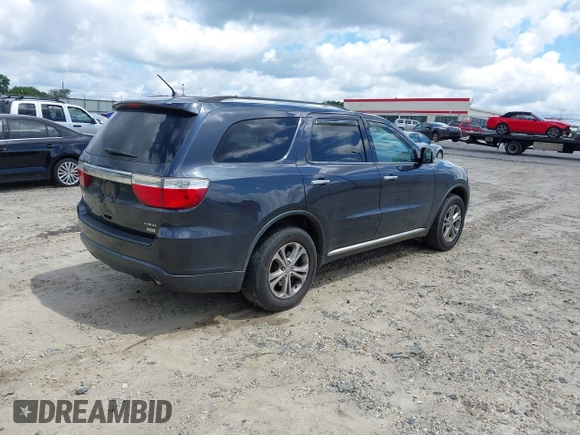 2013 Dodge Durango Crew with VIN 1C4RDHDG7DC657898, listed as a IAAI auction lot 42522353 with 234,483 mi miles and . Bid and sale history available at DreamBid. Image 4.