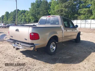 2001 Ford F-150 XLT with VIN 1FTRW07W11KD96140, listed as a IAAI auction lot 42331842 with Not provided miles and . Bid and sale history available at DreamBid. Image 4.