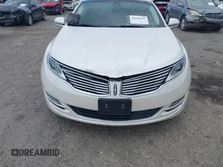 2014 Lincoln MKZ Hybrid z VIN 3LN6L2LU2ER825732, wystawiony jako IAAI lot #42606357 z przebiegiem 153 966 mil mil oraz . Historia ofert i sprzedaży dostępna na DreamBid. Obrazek 13.