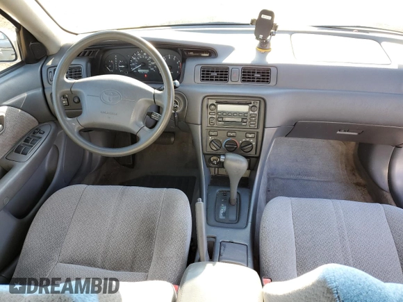 2000 Toyota Camry CE with VIN JT2BG22K0Y0461797, listed as a Copart auction lot 53646765 with 143,315 mi miles and Salvage Title. Bid and sale history available at carsss.com. Image 8.