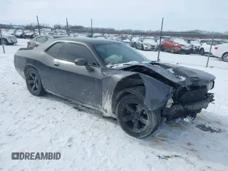 2013 Dodge Challenger SXT z VIN 2C3CDYAG7DH578596, wystawiony jako IAAI lot #41579308 z przebiegiem 177 323 mil mil oraz . Historia ofert i sprzedaży dostępna na DreamBid. Obrazek 1.