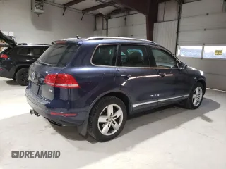 2012 Volkswagen Touareg Exec with VIN WVGEF9BP4CD011773, listed as a Copart auction lot 82461264 with 230,231 mi miles and Clean Title. Bid and sale history available at DreamBid. Image 3.