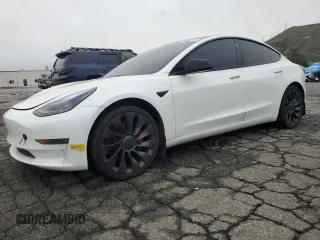 2022 Tesla Model 3 Performance with VIN 5YJ3E1EC3NF135795, listed as a Copart auction lot 48948475 with 149,658 mi miles and Clean Title. Bid and sale history available at carsss.com. Image 1.