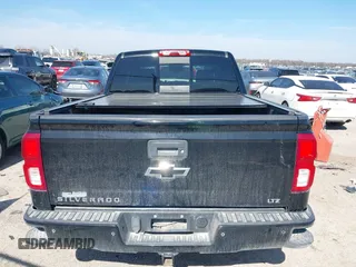 2016 Chevrolet Silverado 1500 LTZ with VIN 3GCUKSEC4GG318090, listed as a IAAI auction lot 41572873 with 82,008 mi miles and . Bid and sale history available at DreamBid. Image 16.