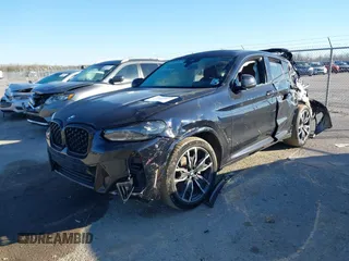 2023 BMW X4 xDrive30i with VIN 5UX33DT00P9S00002, listed as a IAAI auction lot 41674075 with 30,442 mi miles and . Bid and sale history available at DreamBid. Image 2.