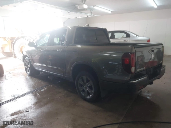 2020 Honda Ridgeline RTL-E with VIN 5FPYK3F75LB001516, listed as a IAAI auction lot 41605859 with 93,902 mi miles. Bid and sale history available at carsss.com. Image 3.