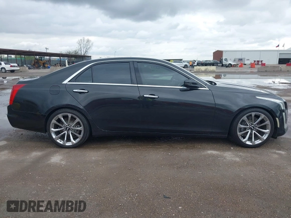 2014 Cadillac CTS Vsport Premium RWD z VIN 1G6AV5S89E0148907, wystawiony jako IAAI lot #41880678 z przebiegiem 148 052 mil mil oraz . Historia ofert i sprzedaży dostępna na DreamBid. Obrazek 13.