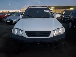 1999 Honda CR-V EX with VIN JHLRD1764XC027015, listed as a Copart auction lot 83231804 with 296,752 mi miles and Non Repairable. Bid and sale history available at carsss.com. Image 5.
