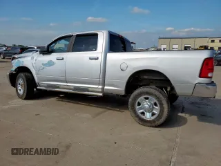 2014 Ram 2500 SLT with VIN 3C6TR5DT2EG205852, listed as a Copart auction lot 59514745 with 130,510 mi miles and Salvage title. Bid and sale history available at DreamBid. Image 2.