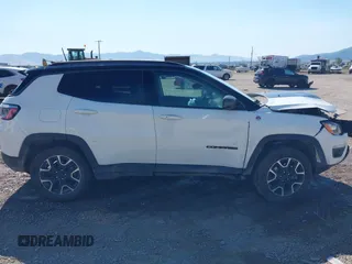 2021 Jeep Compass Trailhawk with VIN 3C4NJDDB0MT551172, listed as a IAAI auction lot 40155947 with 50,794 mi miles and . Bid and sale history available at DreamBid. Image 13.