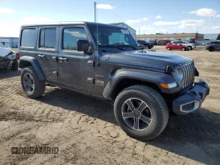 2023 Jeep Wrangler Sahara with VIN 1C4HJXEG5PW632336, listed as a Copart auction lot 54226405 with 23,735 mi miles and Salvage title. Bid and sale history available at DreamBid. Image 4.