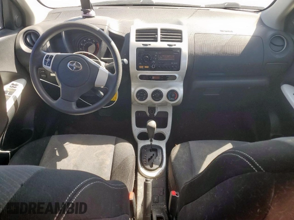 2012 Scion xD with VIN JTKKU4B46C1017963, listed as a Copart auction lot 49777595 with 118,606 mi miles and Salvage Title. Bid and sale history available at DreamBid. Image 8.