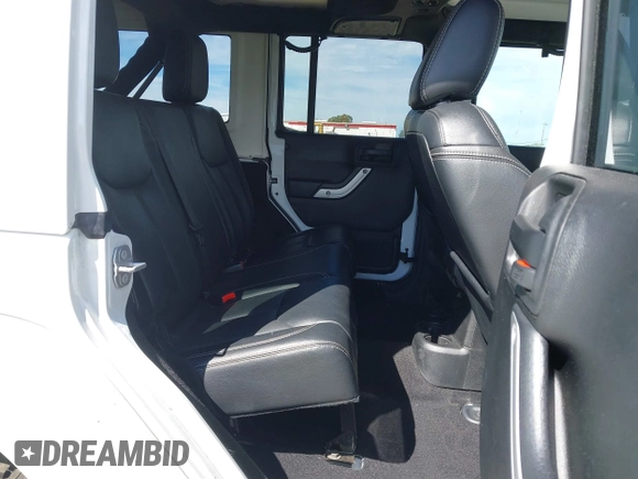 2017 Jeep Wrangler Unlimited Sahara with VIN 1C4BJWEG5HL588535, listed as a IAAI auction lot 42013571 with 70,012 mi miles. Bid and sale history available at carsss.com. Image 8.
