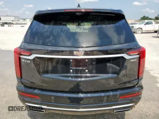 2020 Cadillac XT6 FWD Premium Luxury z VIN 1GYKPCRSXLZ104502, wystawiony jako Copart lot #58211275 z przebiegiem 97 053 mil mil oraz Szkody całkowita. Historia ofert i sprzedaży dostępna na DreamBid. Obrazek 6.
