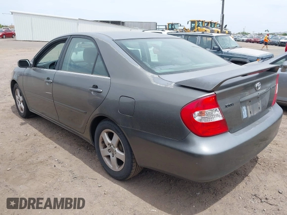 2003 Toyota Camry LE with VIN JTDBE32K530236769, listed as a IAAI auction lot 42250783 with 194,445 mi miles and . Bid and sale history available at DreamBid. Image 3.