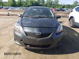 2010 Toyota Yaris with VIN JTDBT4K34A4076104, listed as a Copart auction lot 56981874 with 0 mi miles and Clean Title. Bid and sale history available at carsss.com. Image 5.