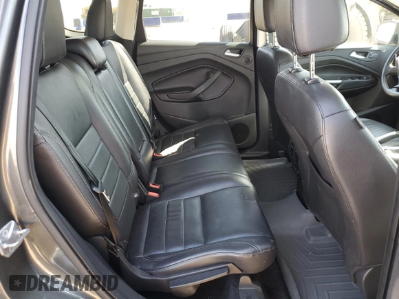 2016 Ford Escape Titanium with VIN 1FMCU9J96GUC63384, listed as a Copart auction lot 52255725 with 136,869 mi miles and Salvage Title. Bid and sale history available at carsss.com. Image 11.