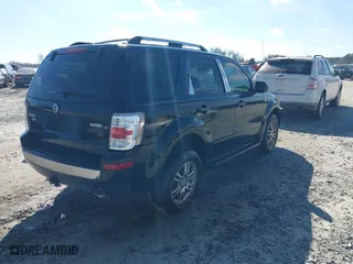 2009 Mercury Mariner Premier with VIN 4M2CU87G29KJ06738, listed as a IAAI auction lot 41659804 with 128,638 mi miles. Bid and sale history available at carsss.com. Image 4.